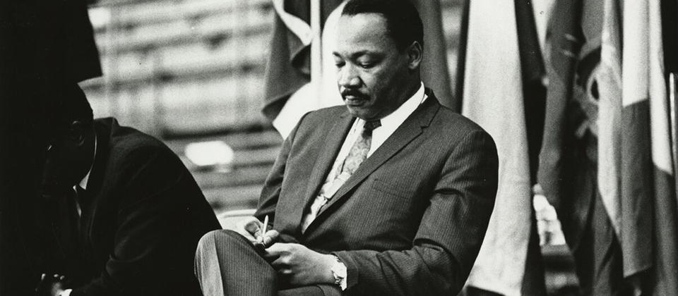 Martin Luther King Jr. prepares for his speech at Kansas State University in 1968