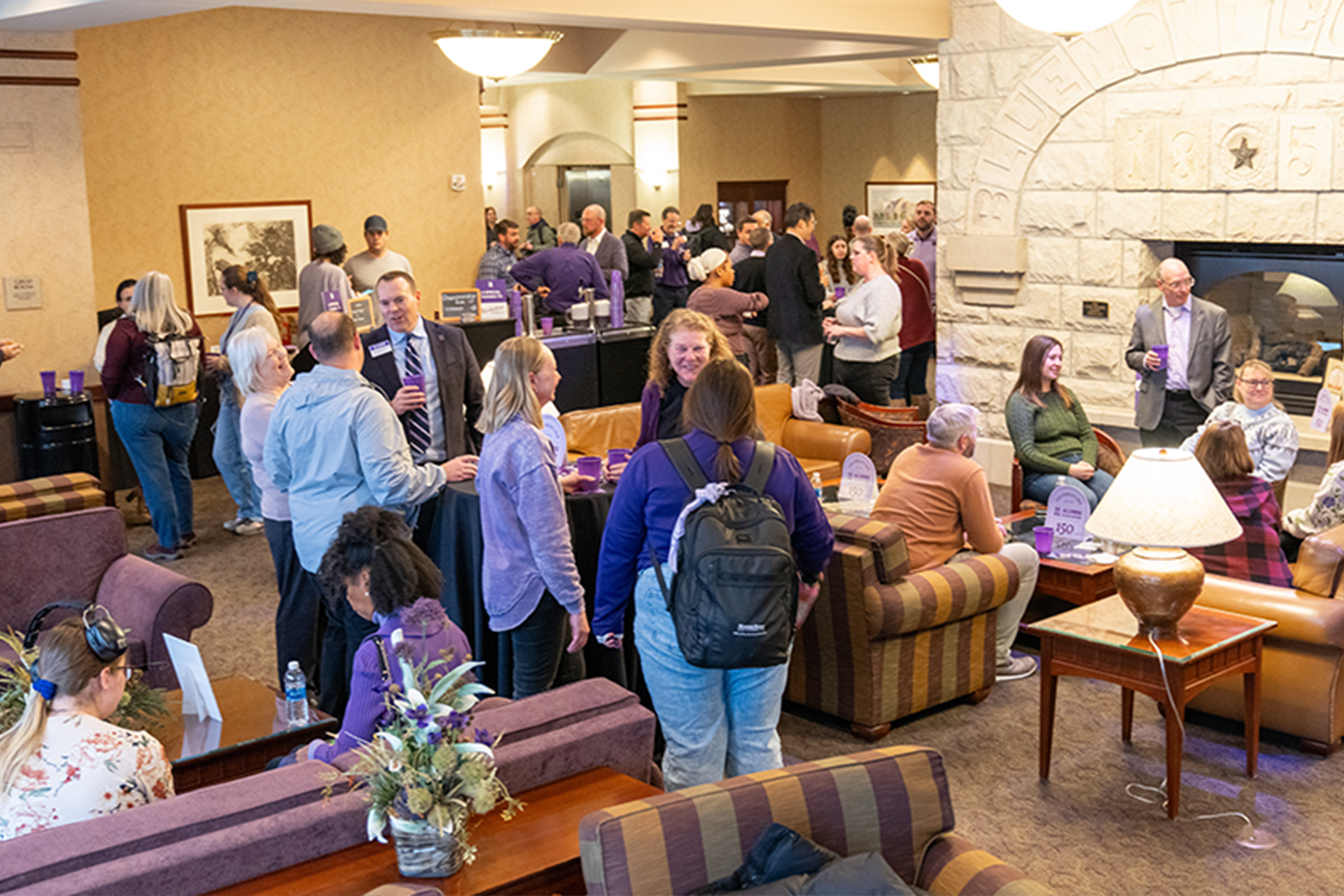 K-State Faculty and Staff gathering for a happy hour in the Tointon Great Room