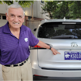 Tulsa Cats leader was instrumental in launching the Oklahoma K-State license plate