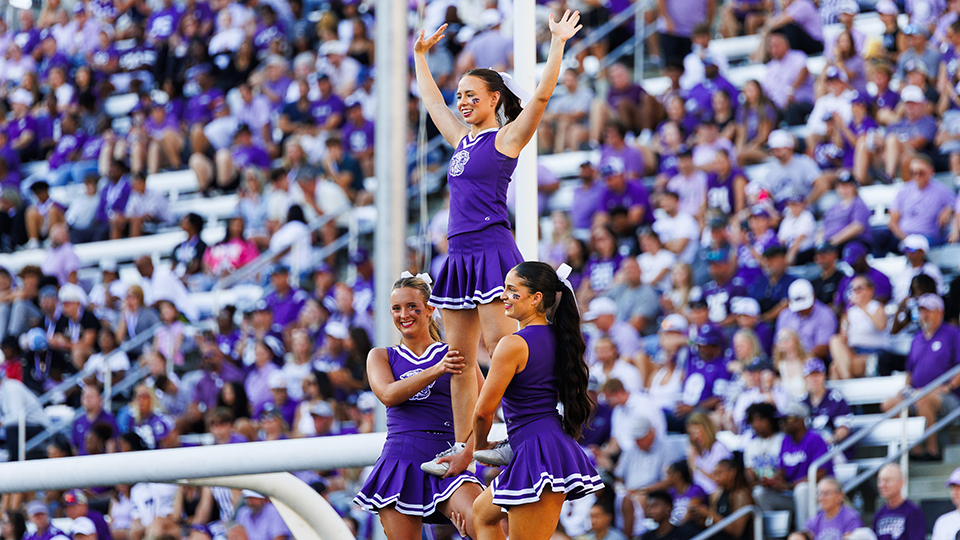 A true team sport: How K-State cheerleaders bring passion, professionalism and purple pride to the field