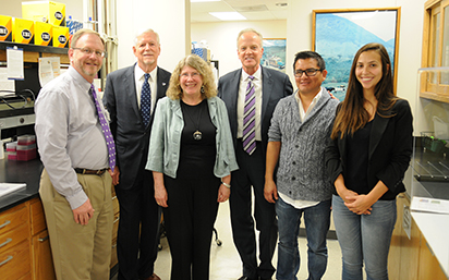 From left, Martin Draper, plant pathology department head; Richard B. Myers ’65, then interim president; Barbara Valent, university distinguished professor; Sen. Jerry Moran; Christian Cruz ’13, research assistant professor; and Giovana Cruppe, doctorate student from Brazil. 