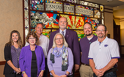 Group in front of mural